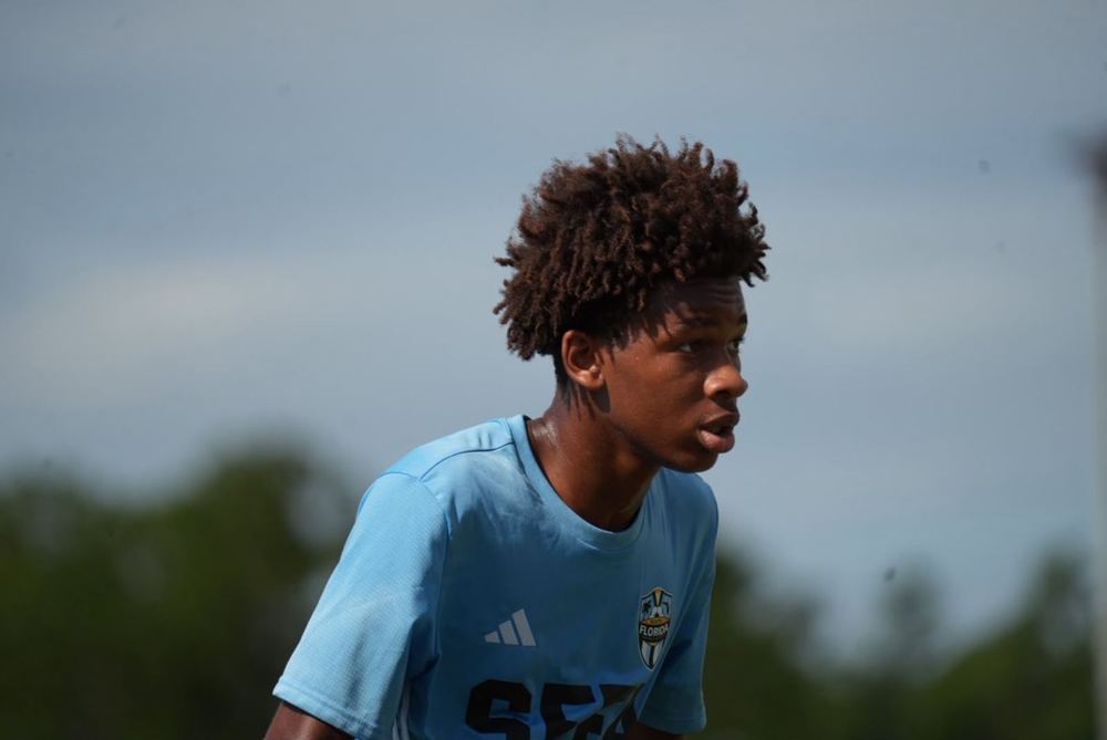 Close-up portrait of Chaz L. Grey on the field in his light blue kit